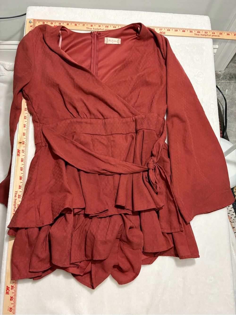 Altarโd State Womenโs Rust Wrap Peplum Romper